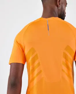 nordic walking Pánske bežecké tričko Run 500 Confort bez švov svetlooranžové
