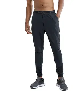 Pánske klasické nohavice Pánske tepláky CRAFT ADV Essence Training čierna - XL