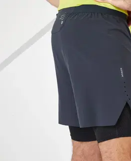 nohavice Pánske bežecké šortky Kiprun 2 v 1 čierno-sivé