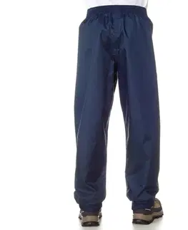 nohavice Detské turistické nepremokavé vrchné nohavice MH100 na 7 až 15 rokov modré