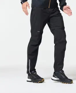 nohavice Pánske nepremokavé bežecké nohavice Run 900 čierne