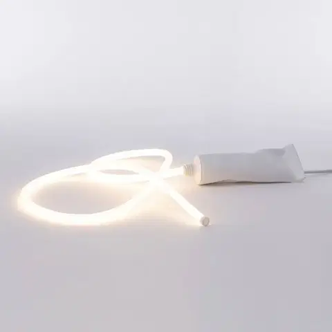 Vnútorné dekoratívne svietidlá SELETTI Stolová LED lampa Daily Glow ako tuba zubnej pasty