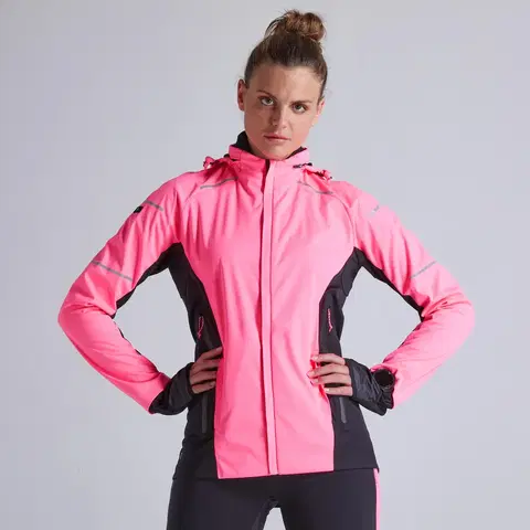 bežecké bundy a vesty Dámska bežecká bunda Kiprun Warm Regul ružová fluorescenčná