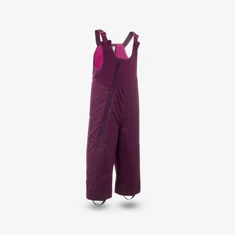 nohavice Detské hrejivé lyžiarske náprsenkové nohavice 500 Warm fialové